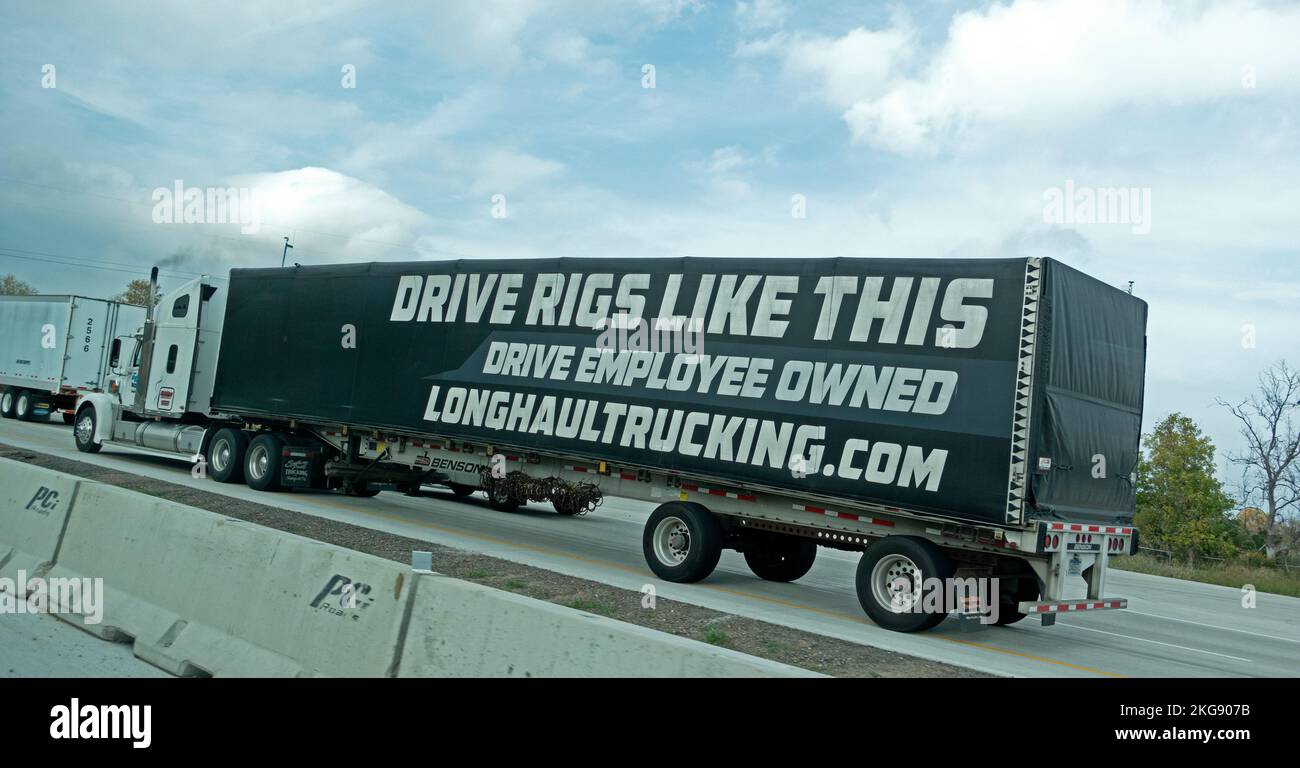 Truck panel advertising employment at 'LongHaulTrucking.com' 'Drive Employee Owned'   'Drive Rigs Like This'. Minneapolis Minnesota MN USA Stock Photo