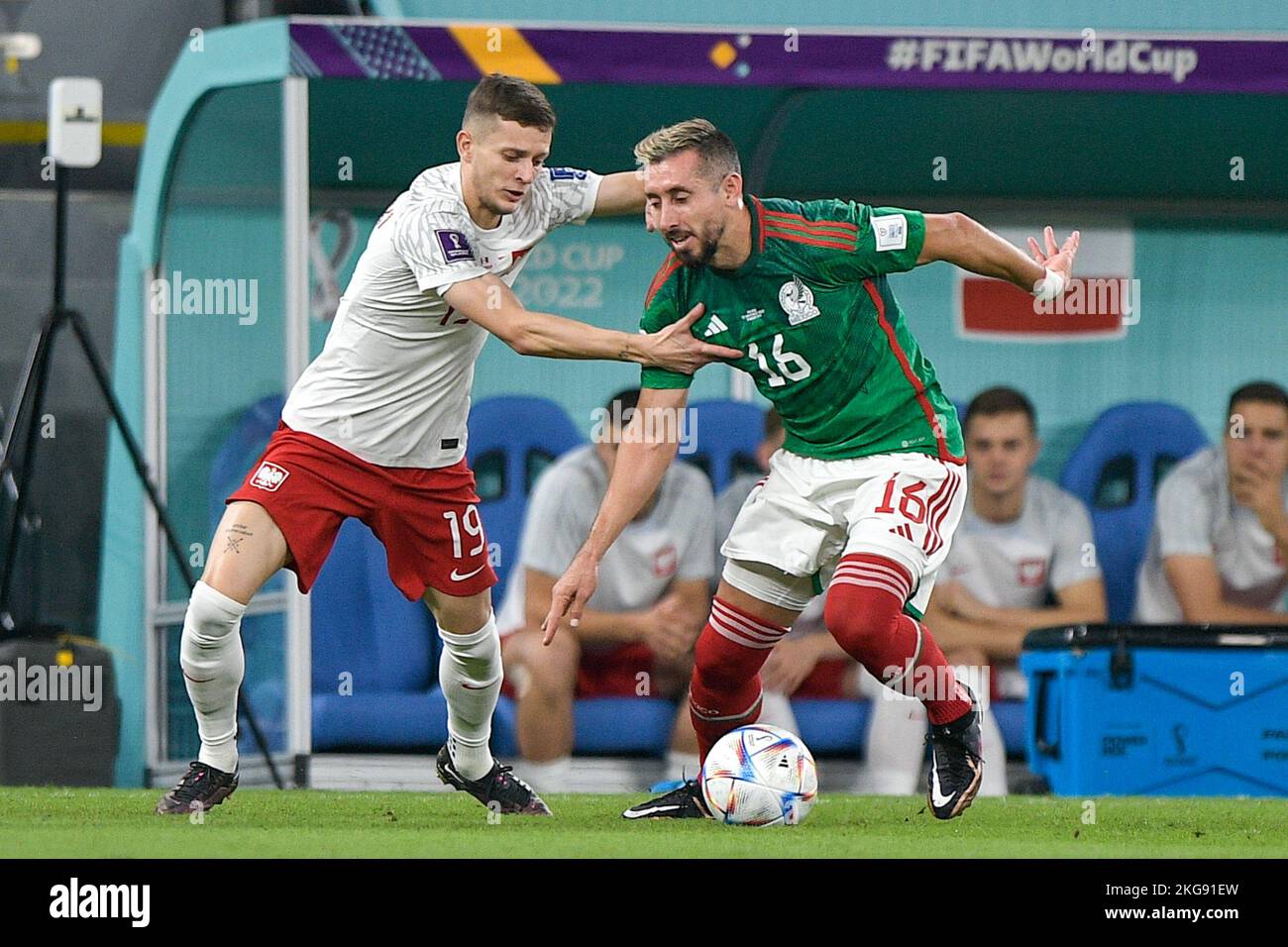 DOHA, QATAR - NOVEMBER 22: Sebastian Szymanski of Poland battles for the ball with Hector Herrera of Mexico during the Group C - FIFA World Cup Qatar 2022 match between Mexico and Poland at Stadium 974 on November 22, 2022 in Doha, Qatar (Photo by Pablo Morano/BSR Agency) Credit: BSR Agency/Alamy Live News Credit: BSR Agency/Alamy Live News Stock Photo