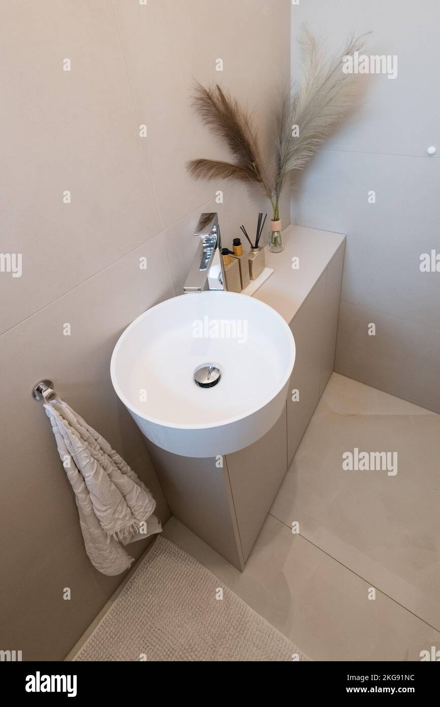 Tiny bathroom in pastel colors of apartment Stock Photo