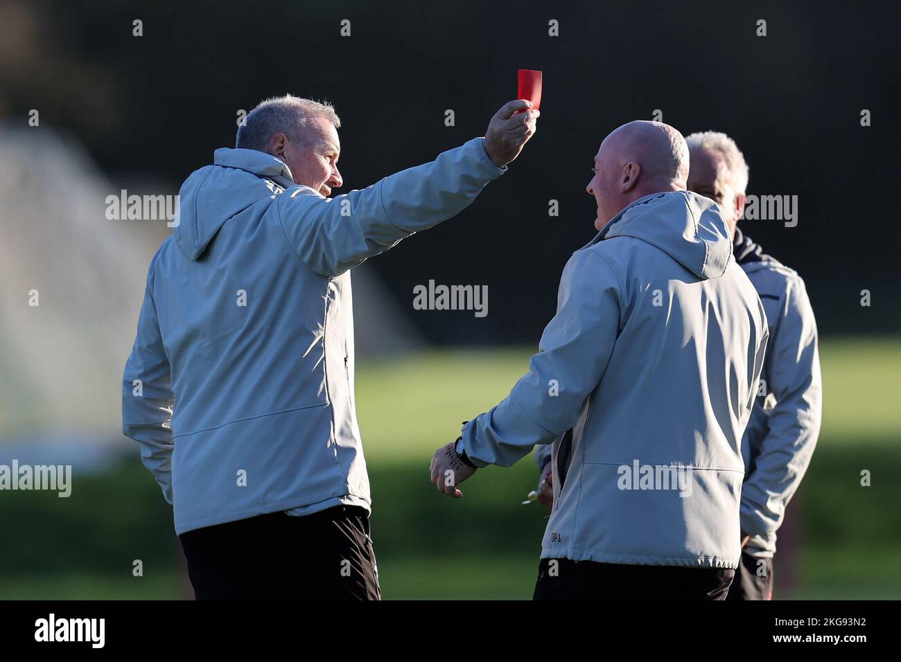Cardiff, UK. 22nd Nov, 2022. Wayne Pivac, the head coach of Wales rugby team jokingly shows a red card to a member of his coaching team during the Wales rugby training session, Vale of Glamorgan on Tuesday 22nd November 2022. pic by Andrew Orchard/Andrew Orchard sports photography/ Alamy Live News Credit: Andrew Orchard sports photography/Alamy Live News Stock Photo