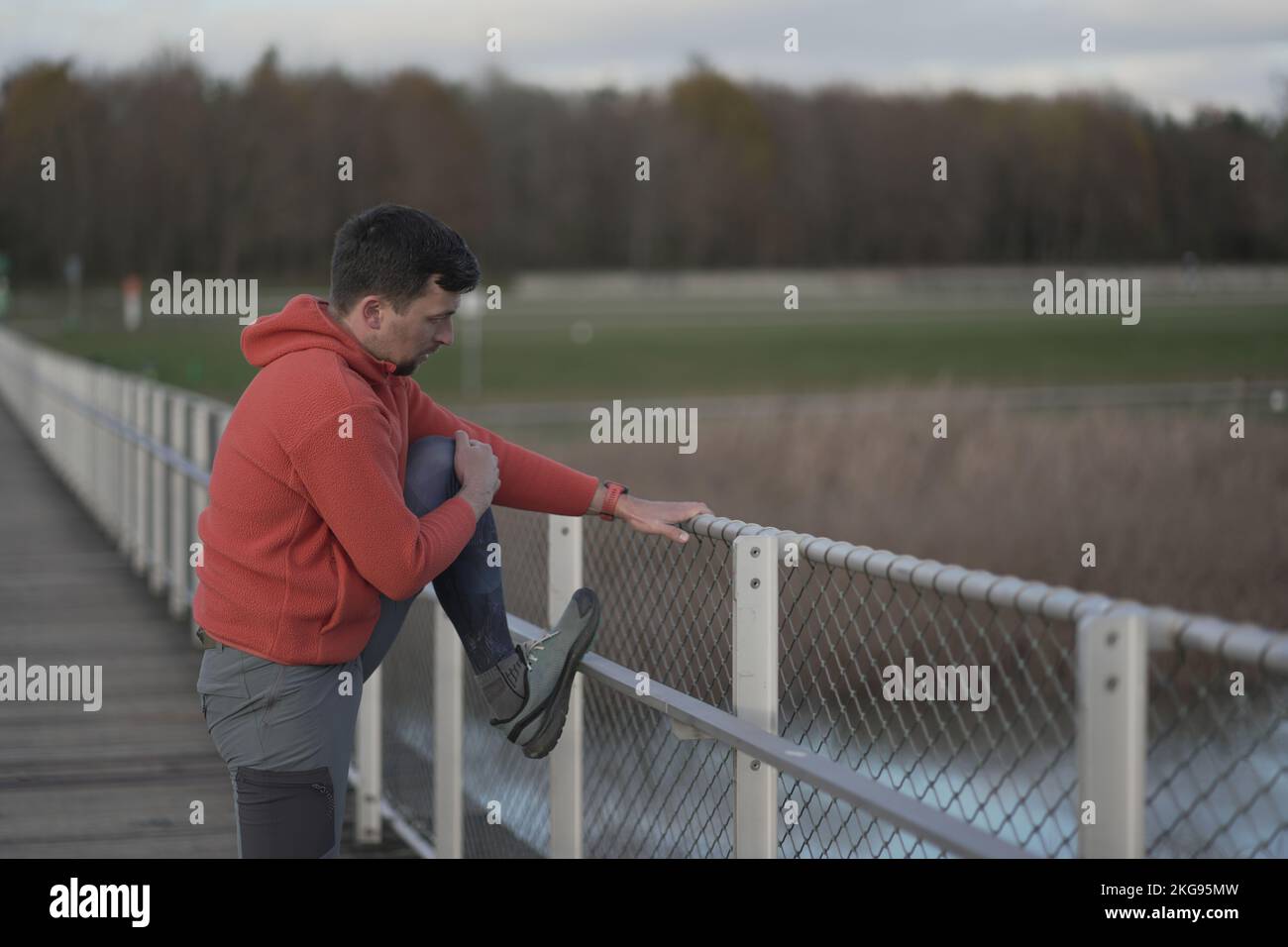Guy stretching body muscles on hi-res stock photography and images - Alamy