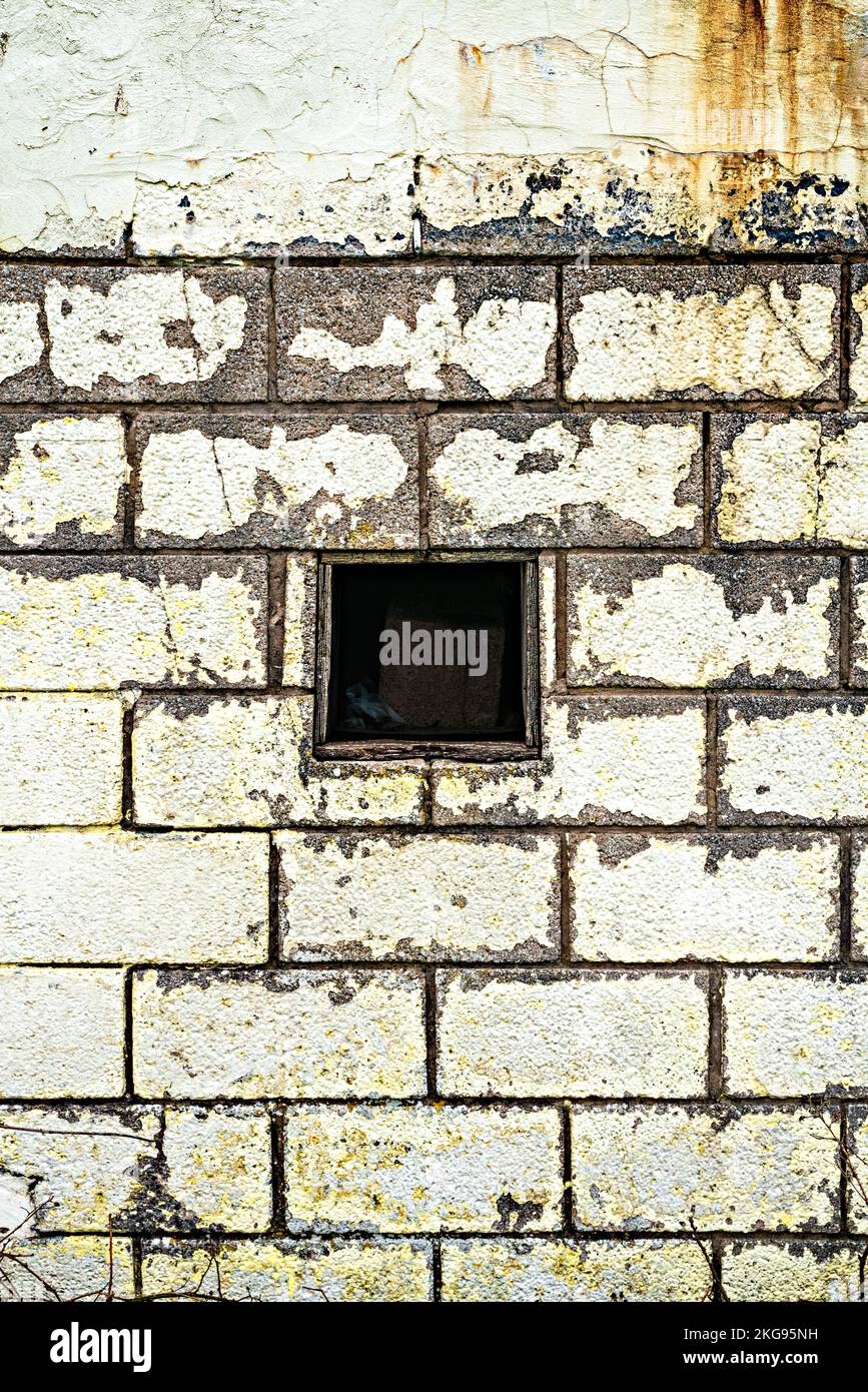 Peeling paint on block wall Stock Photo