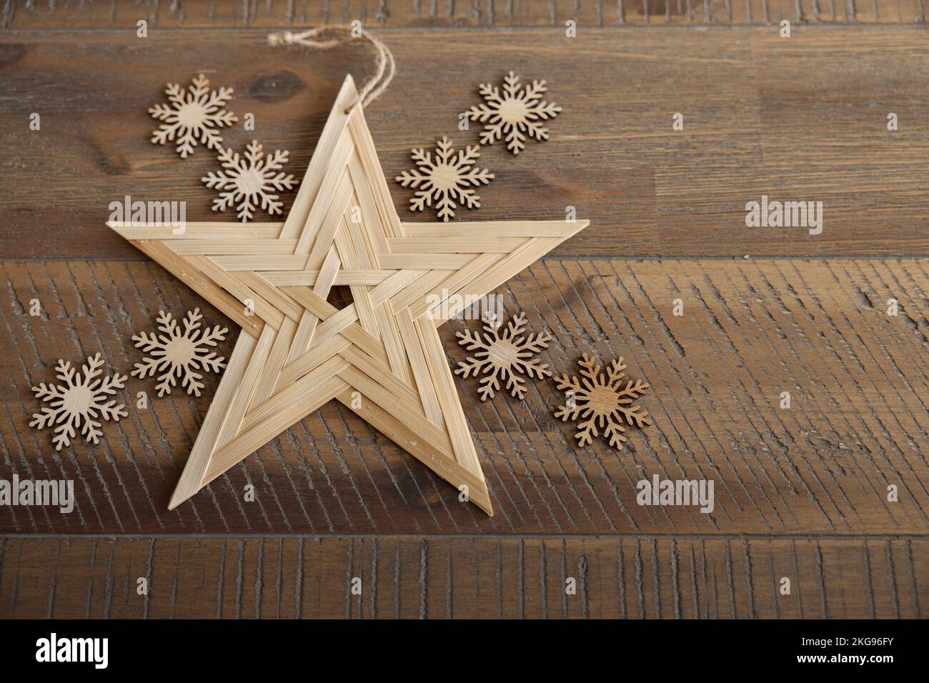New Year's natural decorations made of wood lies on a beautiful wooden table, space for text Stock Photo