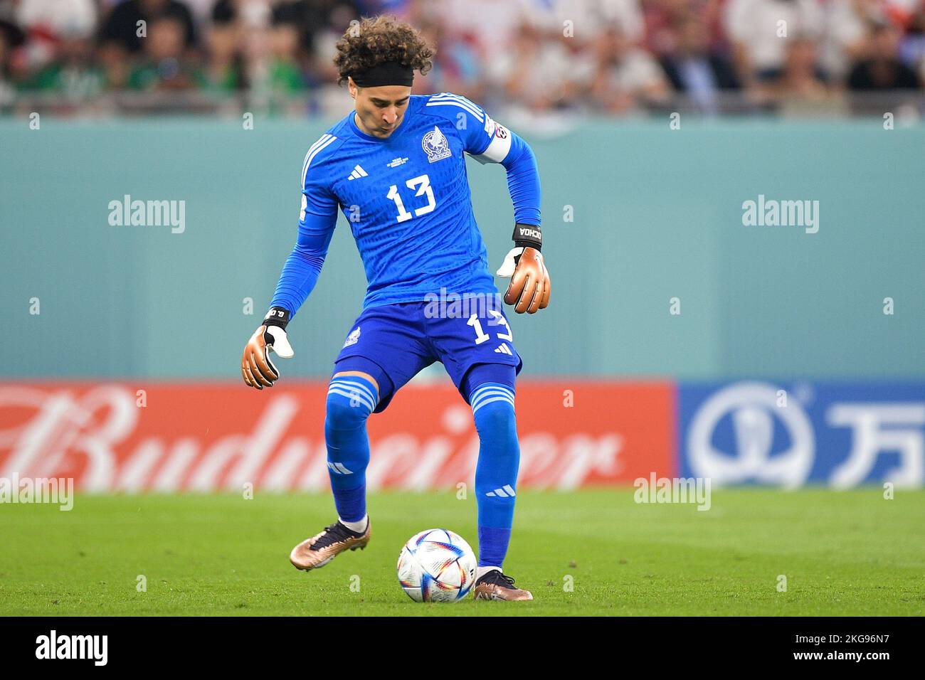 DOHA, QATAR - NOVEMBER 22: Guillermo Ochoa of Mexico passes the ball during the Group C - FIFA World Cup Qatar 2022 match between Mexico and Poland at Stadium 974 on November 22, 2022 in Doha, Qatar (Photo by Pablo Morano/BSR Agency) Credit: BSR Agency/Alamy Live News Stock Photo