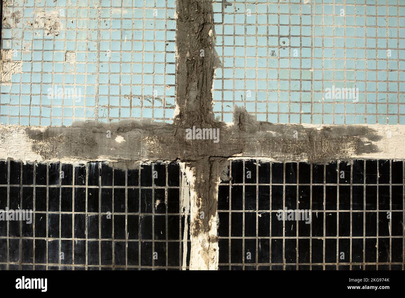 Repairing wall. Cement on wall. Crack in building. Repair details Stock