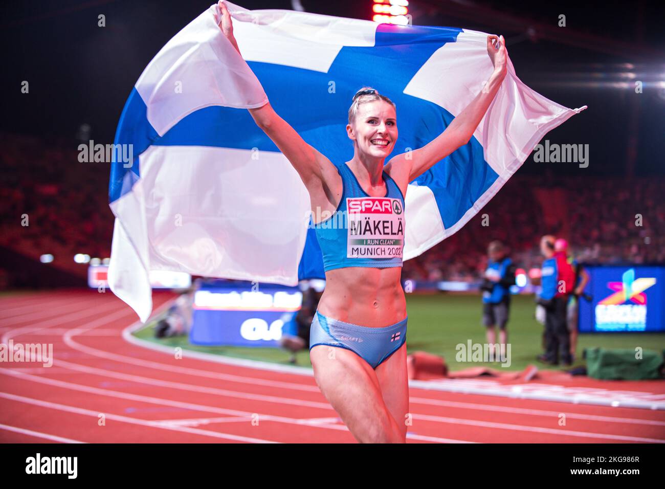 kristiina-m-kel-with-her-country-s-flag-of-the-triple-jump-at-the