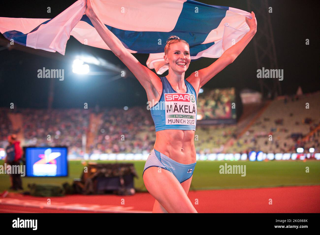 Kristiina M kel With Her Country s Flag Of The Triple Jump At The kristiina-m-kel-with-her-country-s-flag-of-the-triple-jump-at-the