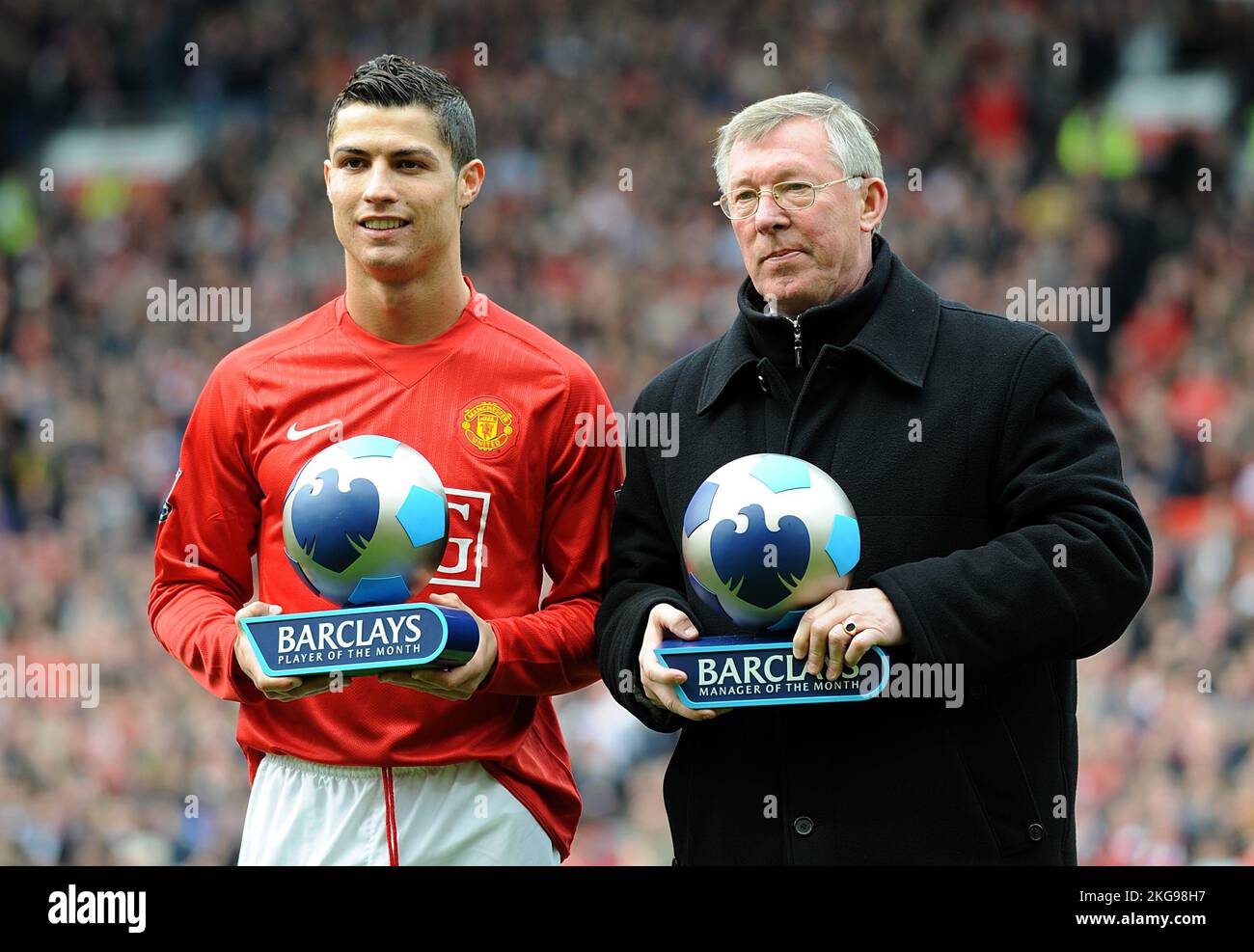 File photo dated 13-04-2008 of Cristiano Ronaldo and Sir Alex Ferguson receiving their manager and player of the month trophies. Cristiano Ronaldo is to leave Manchester United with immediate effect, the Premier League club have announced. Issue date: Tuesday November 22, 2022. Stock Photo