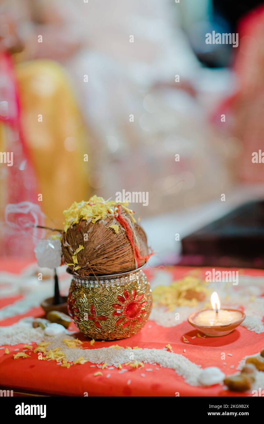 Indian rituals on an auspicious day to perform pooja by placing coconut