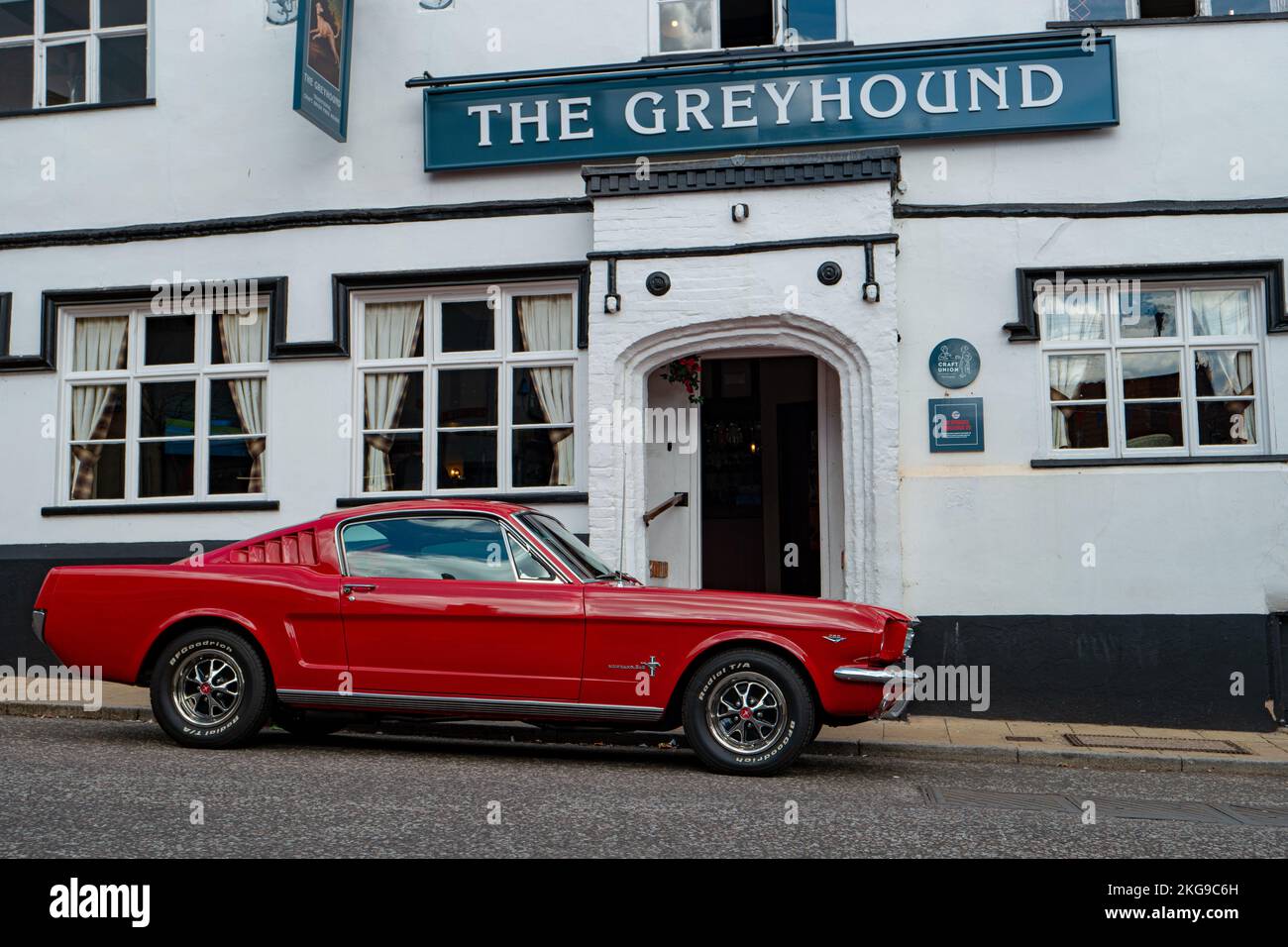 Red fastback Ford Mustange, outside the Geyhound pub, during the Diss