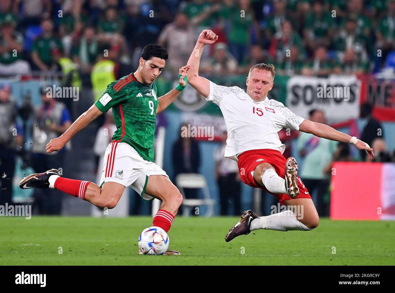 Doha, Qatar. 22nd Nov, 2022. Raul Jimenez (L) of Mexico vies with Kamil Glik of Poland the Group C match between Mexico and Poland of the 2022 FIFA World Cup at Ras Abu Aboud (974) Stadium in Doha, Qatar, Nov. 22, 2022. Credit: Chen Cheng/Xinhua/Alamy Live News Stock Photo