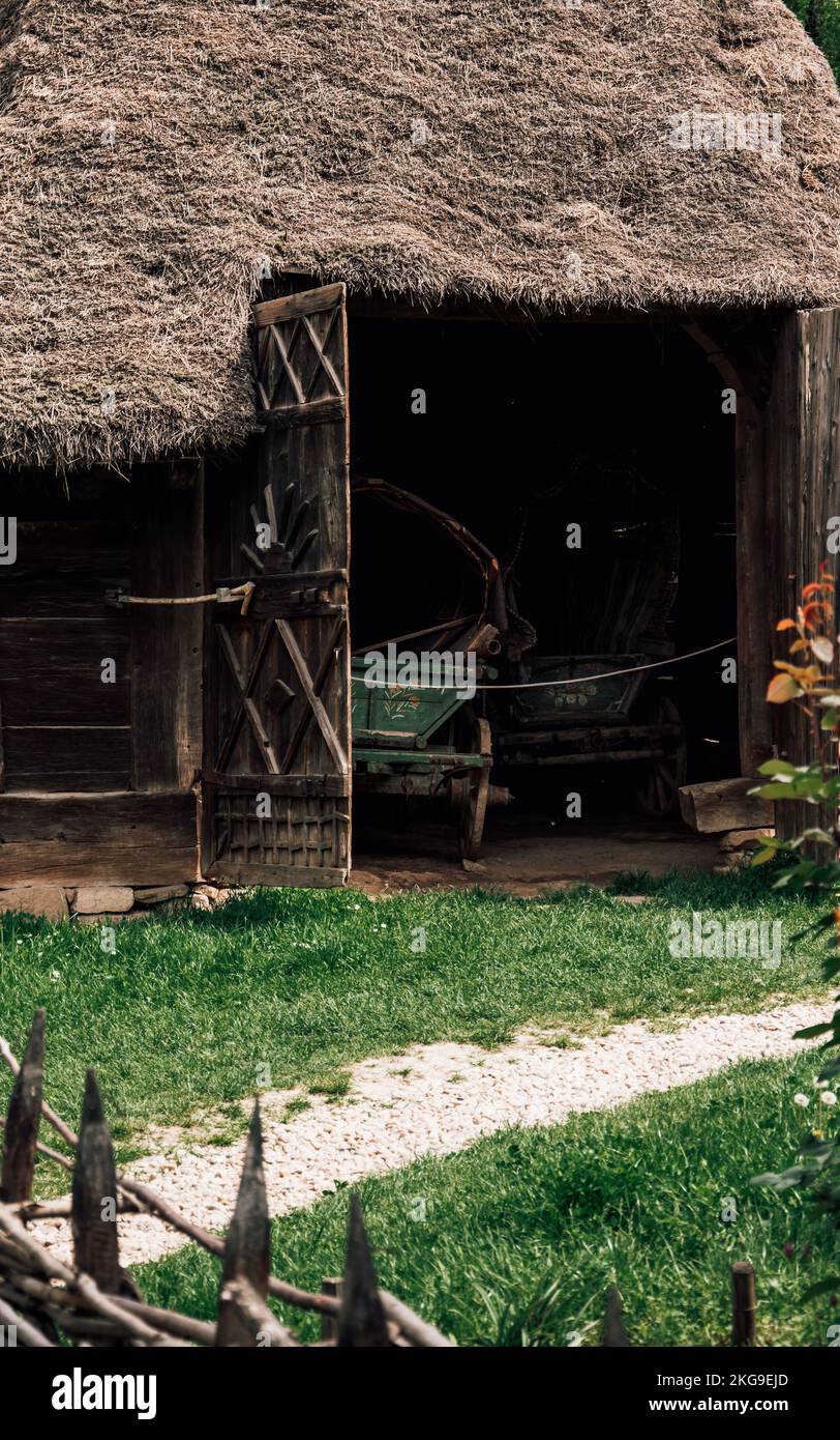 A vertical shot of a barn in national museum of Dimitrie Gusti in Bucharest, Romania Stock Photo