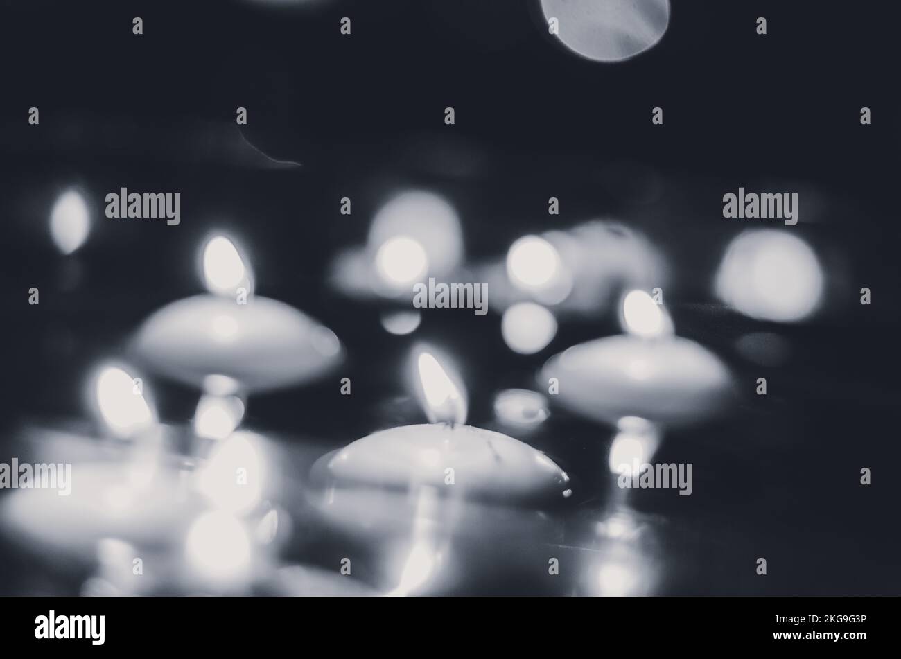 burning candles floating on water surface in dark, European christmas tradition Stock Photo Alamy
