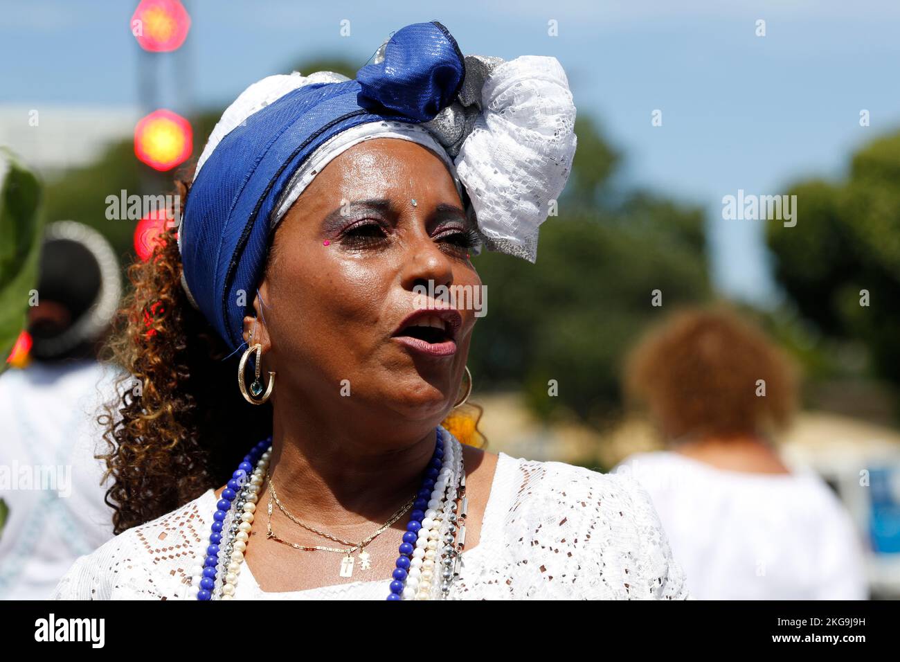 Black movement woman take part at celebration of brazilian Black Awareness Day at the monument to Zumbi dos Palmares with candomblé music Stock Photo