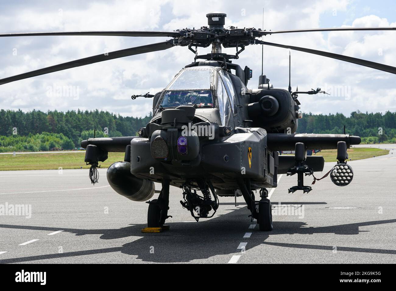 Liepaja, Latvia - August 07, 2022: AH-64D Apache attack helicopter from United States army after landing at the airport runway Stock Photo