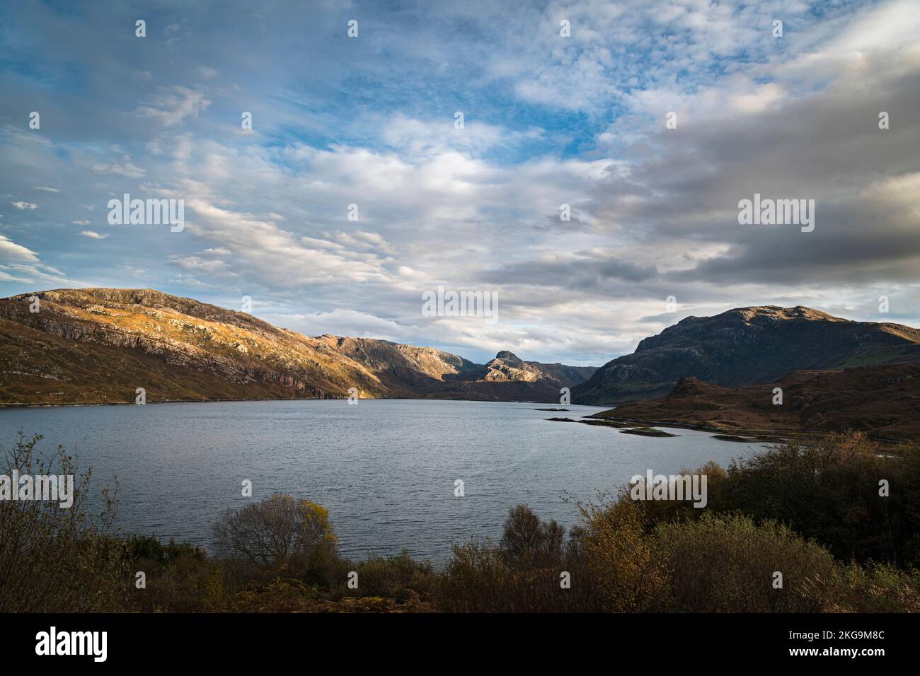 A pleasant, autumnal HDR image of Loch Glencoul with Stack of Glencoul in the distance near Unapool in Assynt, Sutherland, Scotland. 25 October 2022 Stock Photo