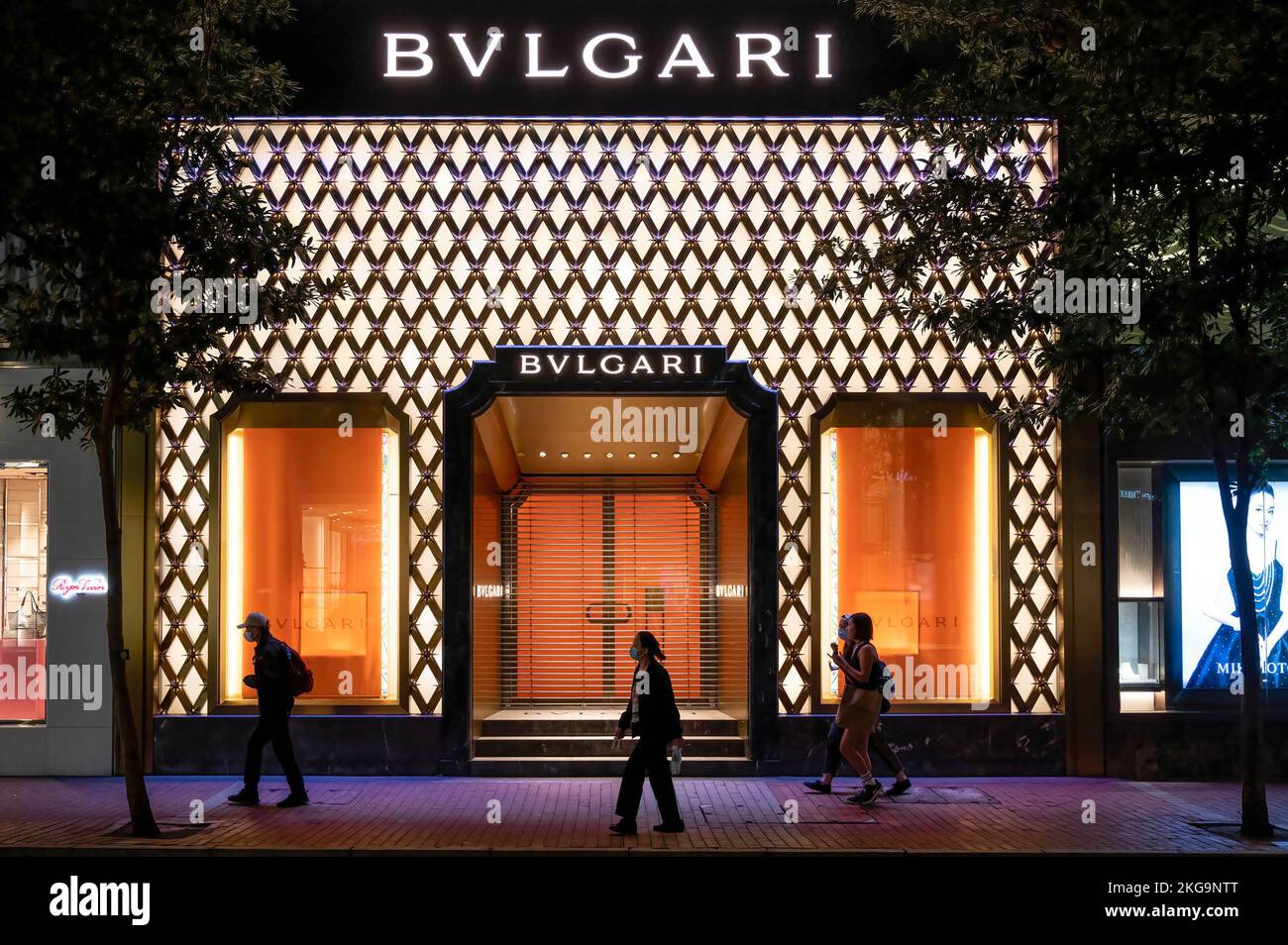 Pedestrians walk past the Italian luxury accessory brand store Bulgari