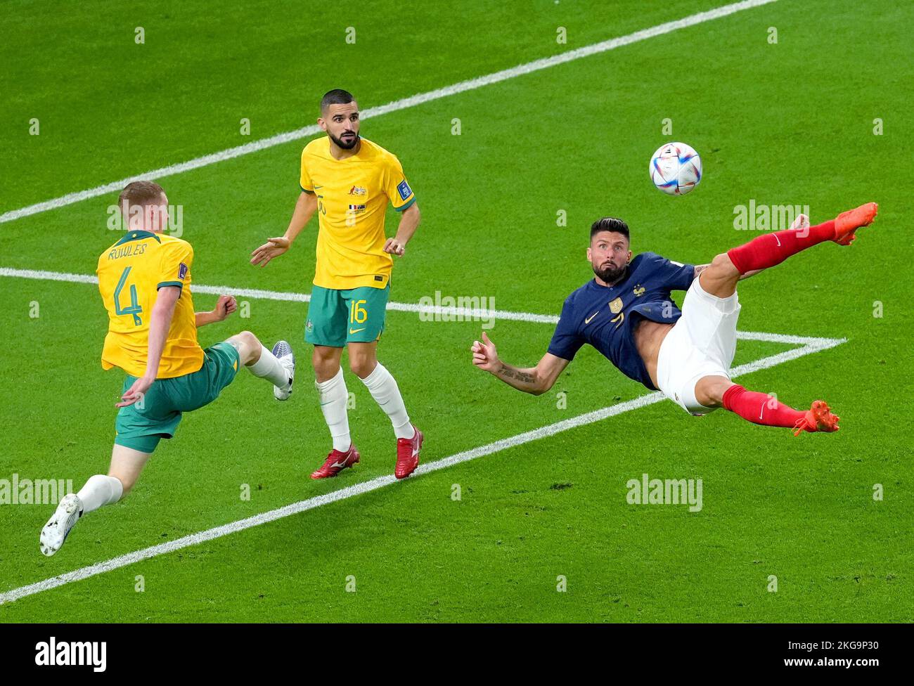 France's Olivier Giroud (right) attempts an overhead kick during the FIFA World Cup Group D match at Al Janoub Stadium, Al Wakrah. Picture date: Tuesday November 22, 2022. Stock Photo