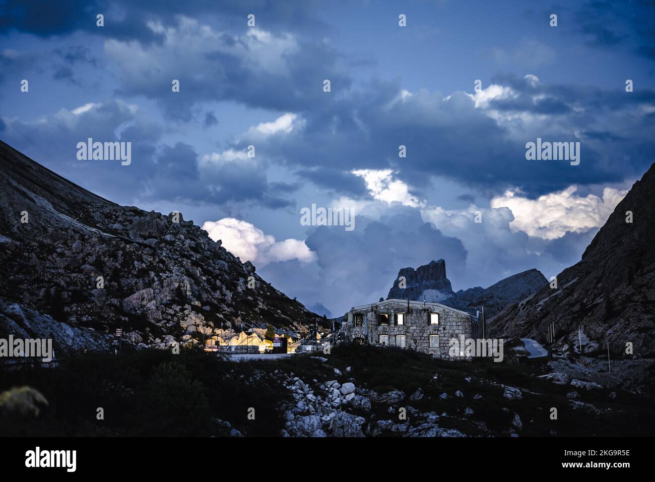 Description: Thunderclouds passing over the Falzarago great war museum in the evening. Falzarego pass, Dolomites, South Tirol, Italy, Europe. Stock Photo