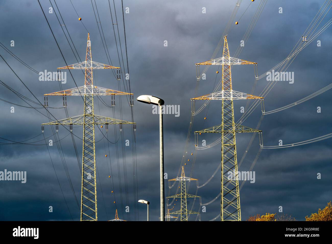 High voltage pylons, overhead lines, with warning coating for air traffic, near Krefeld, NRW, Germany, Stock Photo