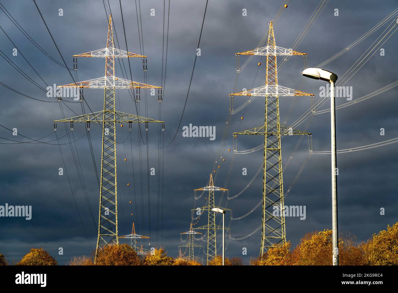 High voltage pylons, overhead lines, with warning coating for air traffic, near Krefeld, NRW, Germany, Stock Photo