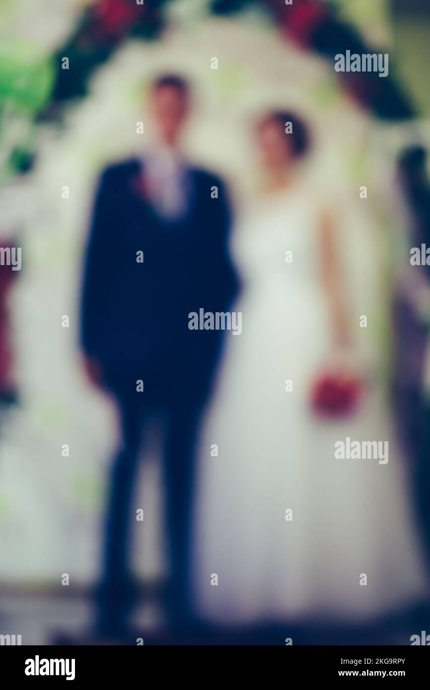 Newlyweds on their wedding day, blur photo Stock Photo Alamy
