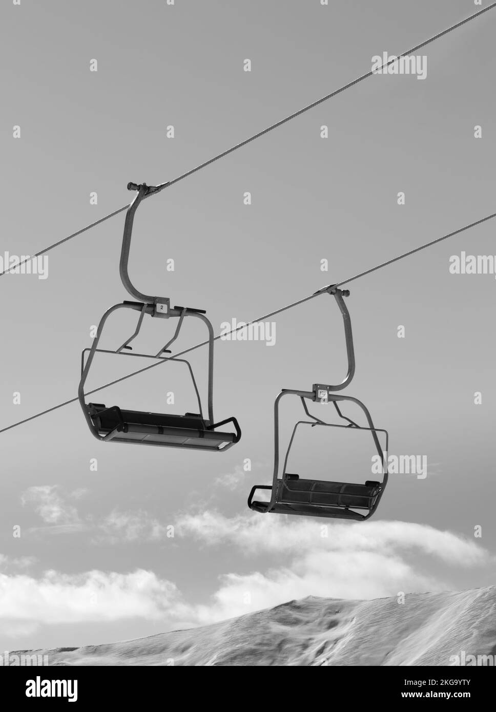 Chair lifts and snowy winter high mountains. Caucasus Mountains
