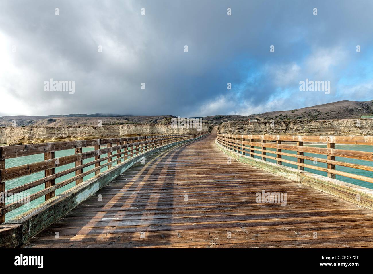 Santa Rosa pier walkway to the island shows its weathered, worn look and unique patterns. Stock Photo