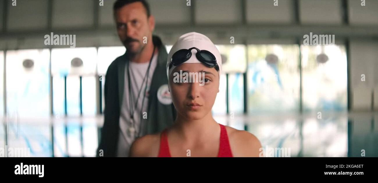 THE SWIMMERS, from left Ali Suliman, Nathalie Issa, 2022. © Netflix