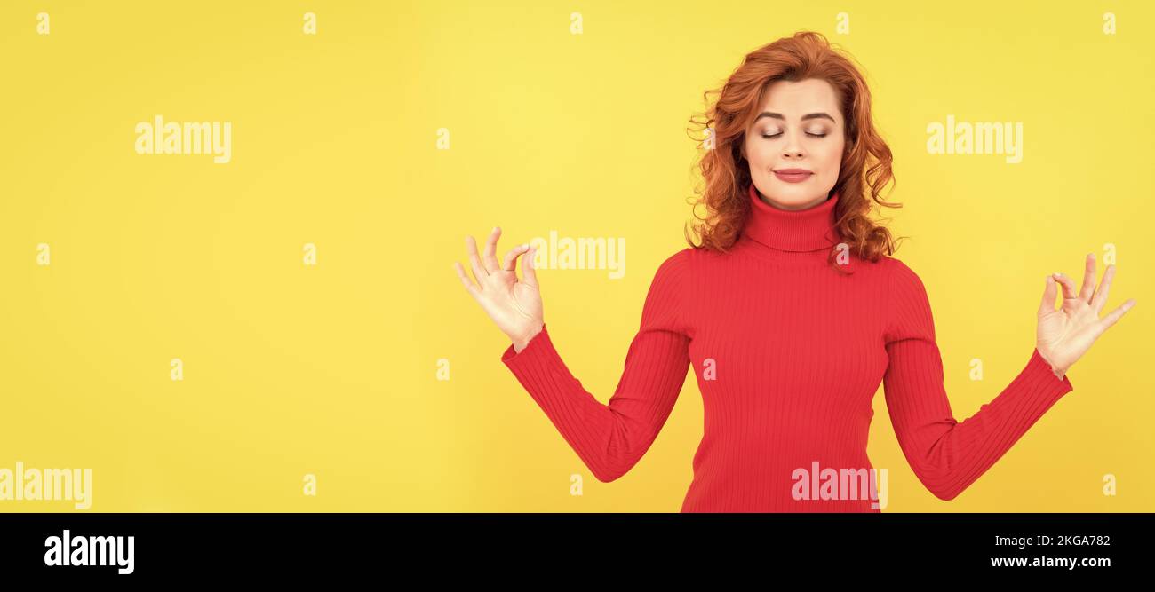 Woman isolated face portrait, banner with copy space. young redhead woman relax meditating with closed eyes, yoga meditation. Stock Photo