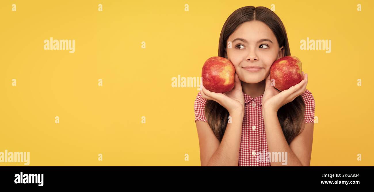 childhood health. natural organic fresh apple. healthy life. diet and kid beauty. Child girl portrait with apple, horizontal poster. Banner header Stock Photo