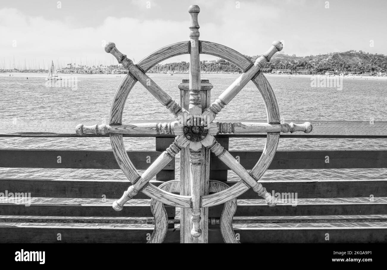 Antique ship steering wheel at Stearns Wharf in Santa Barbara, California, USA Stock Photo