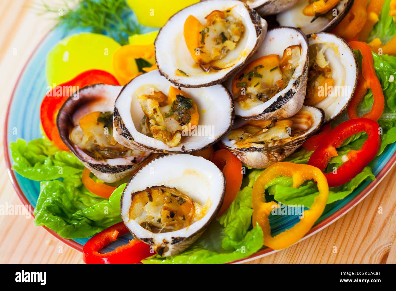 Baked in oven bivalve shellfishes Stock Photo - Alamy