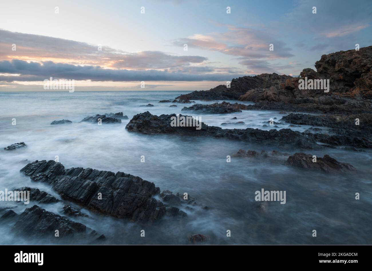 Waves break over the jagged rocks at Second Valley, South Australia ...