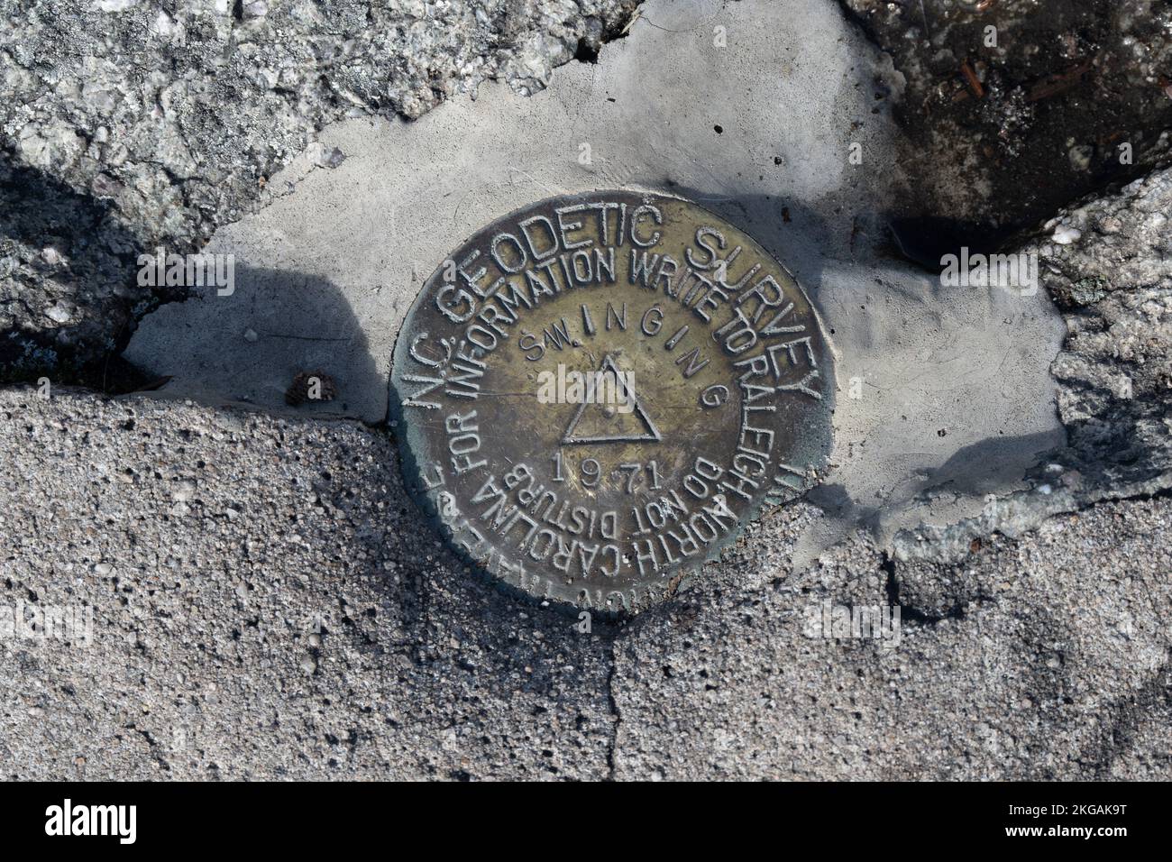 A Noth Carolina Geodetic Survey Marker found on top of Grandfather Mountain Stock Photo
