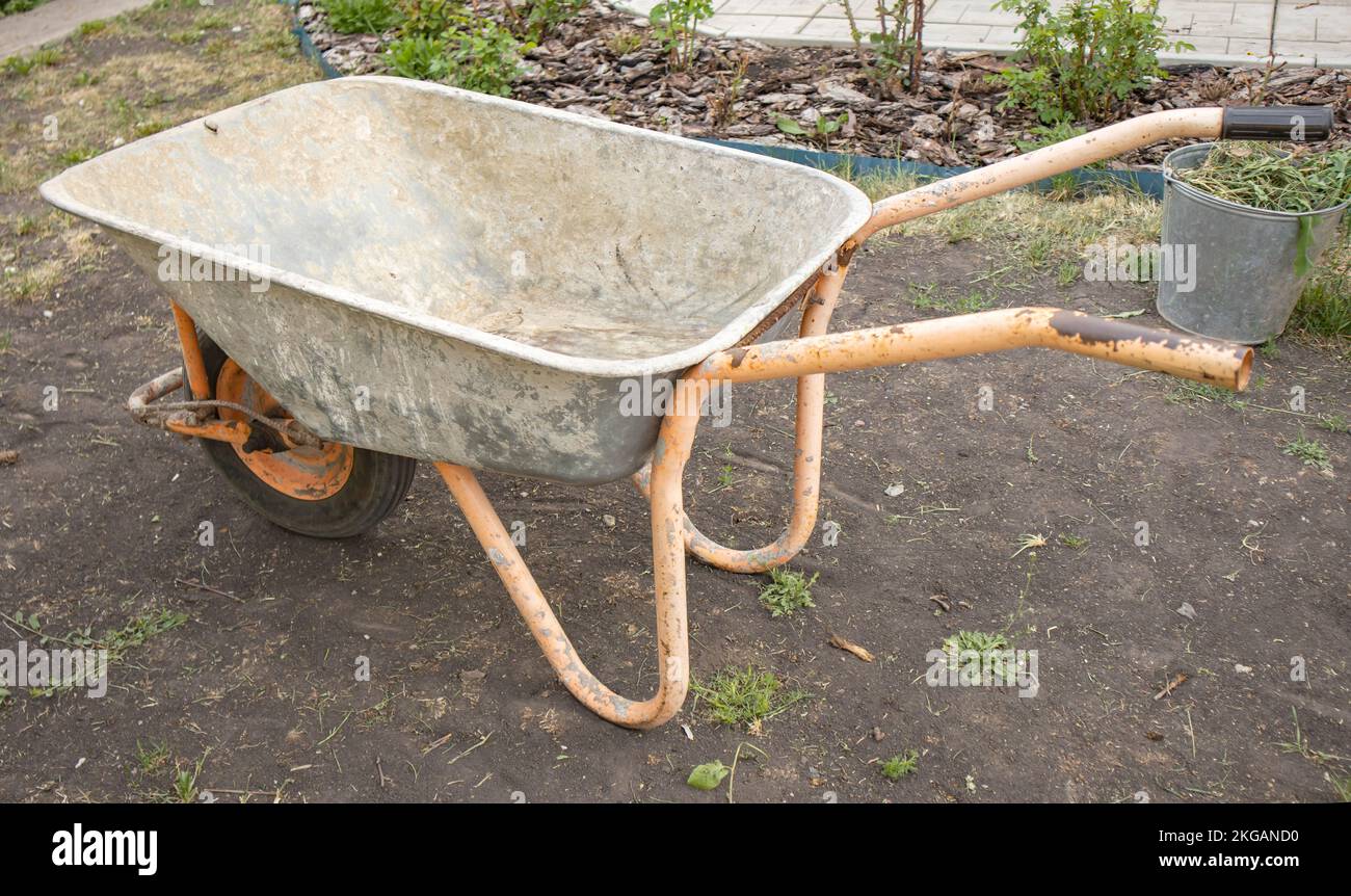 Garden cleaning equipment. An empty garden cart in closeup for
