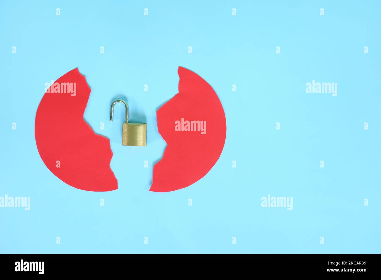 Data breach and information theft concept. Creative composition of broken security padlock. Stock Photo