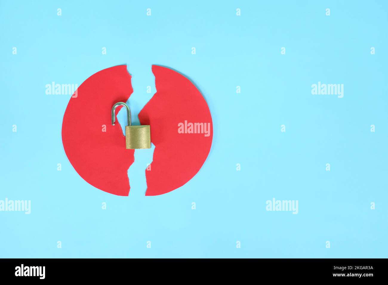 Data breach and information theft concept. Creative composition of broken security padlock. Stock Photo
