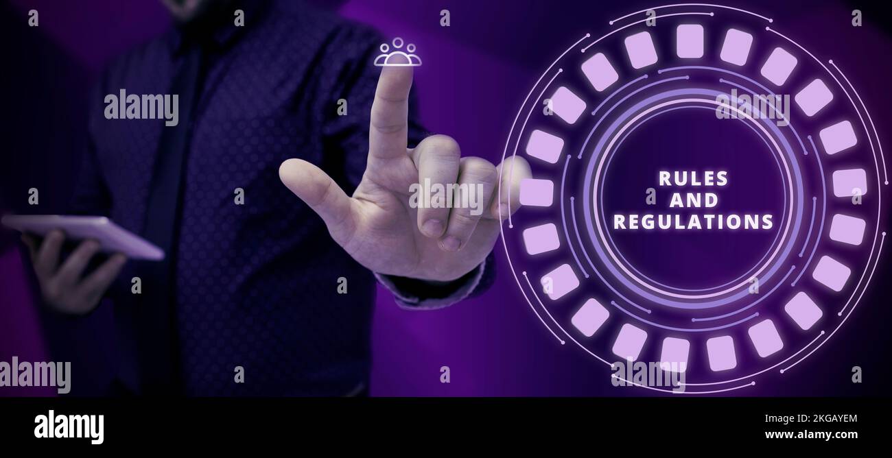 Hand writing sign Rules And Regulations. Business approach guidelines ...