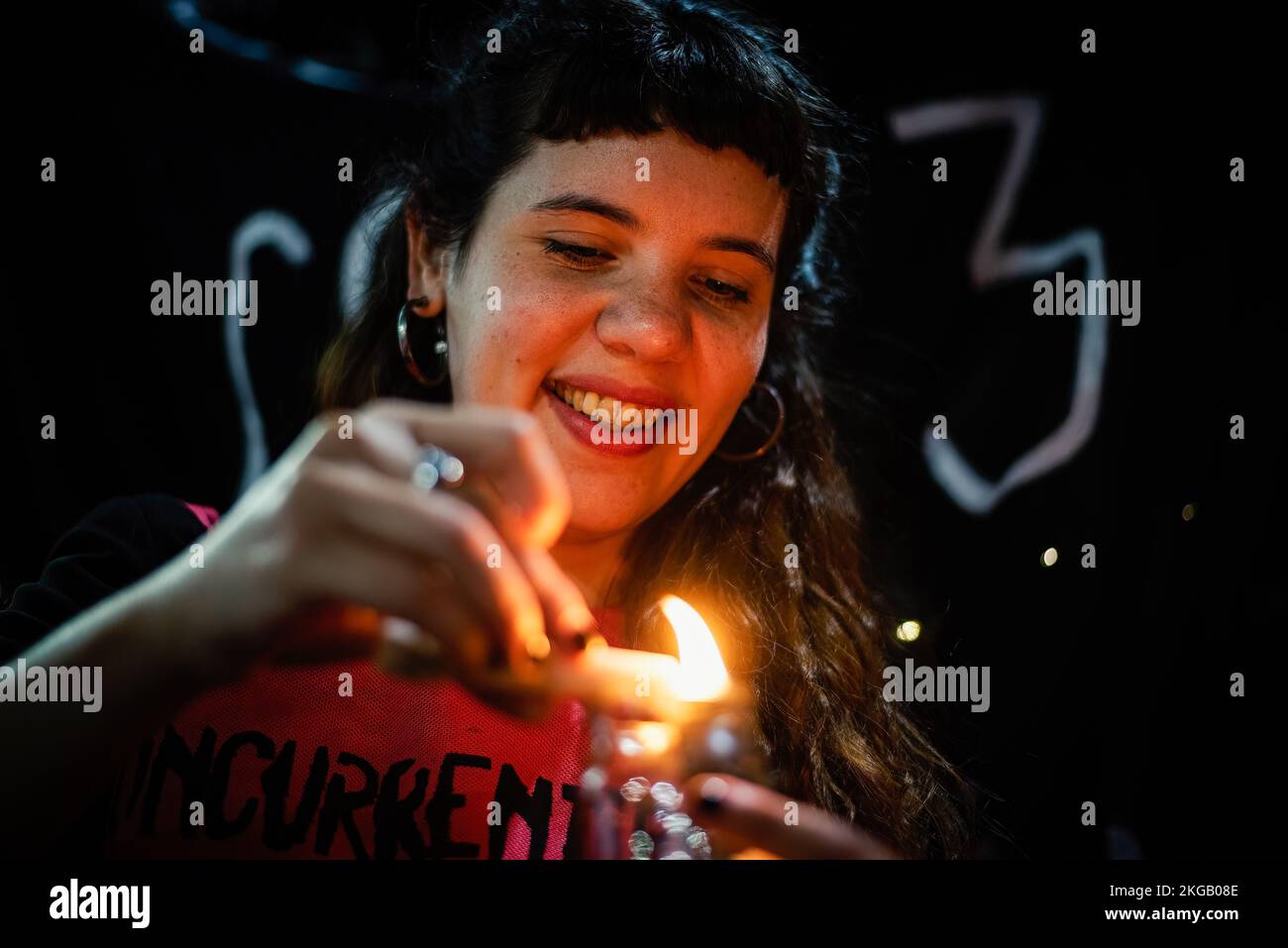 Buenos Aires, Argentina. 22nd Nov, 2022. A health worker lights a candle during the public health rally over low wages and poor working conditions due to the crisis of the public health system. Argentine medics take part in a public health rally called The Lights' Night. Credit: SOPA Images Limited/Alamy Live News Stock Photo