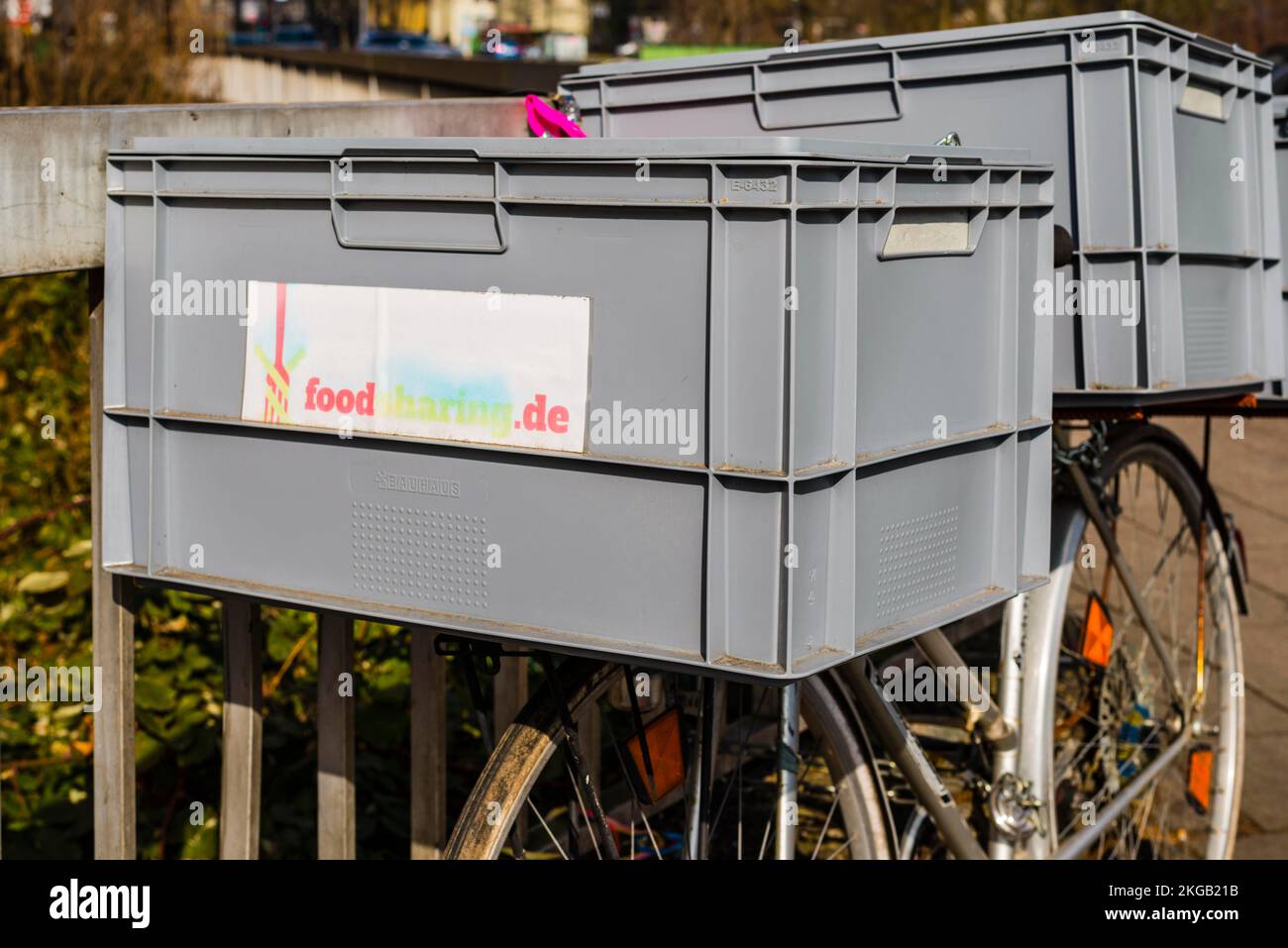 Bicycle with plastic containers from foodsharing, food distributor