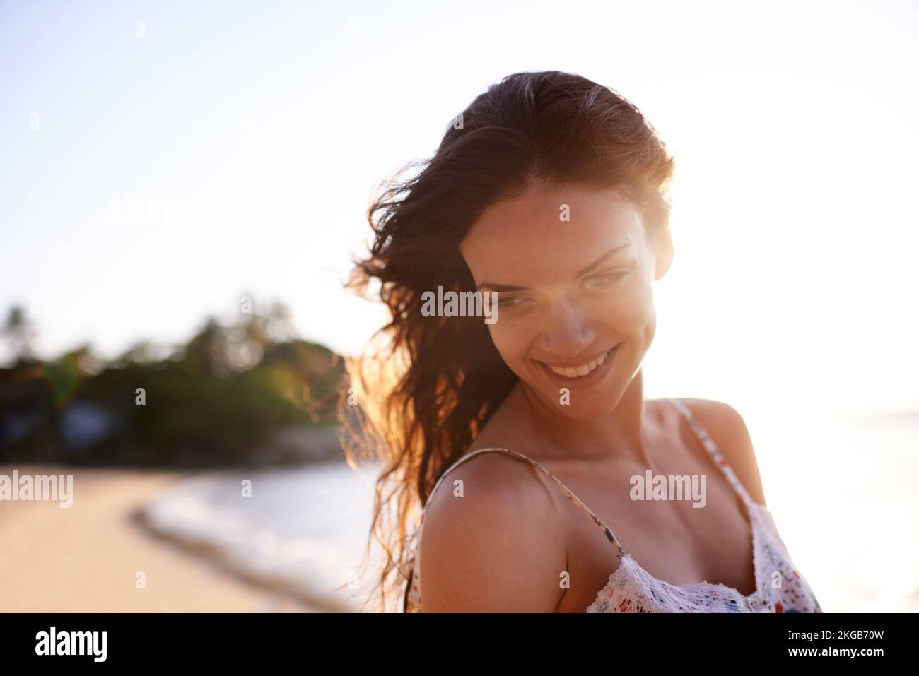 This is the best break I ever had. a beautiful young woman on the beach. Stock Photo
