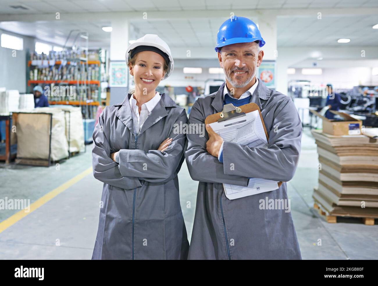 Our business is a well-oiled machine. a people working inside a printing, packaging and distribution factory. Stock Photo