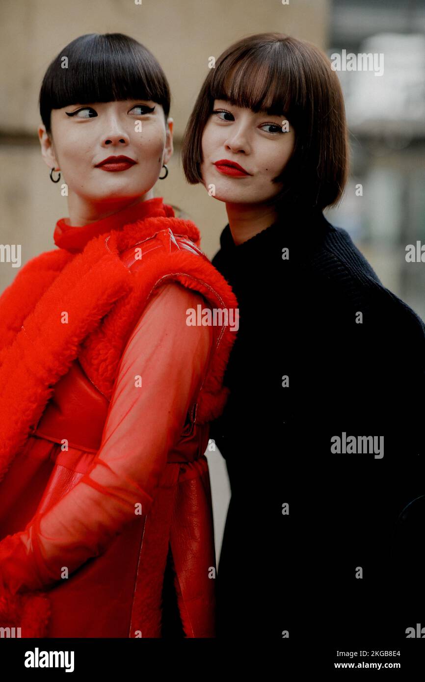 Street style, Kozue Akimoto and Emma arriving at Sacai Spring Summer