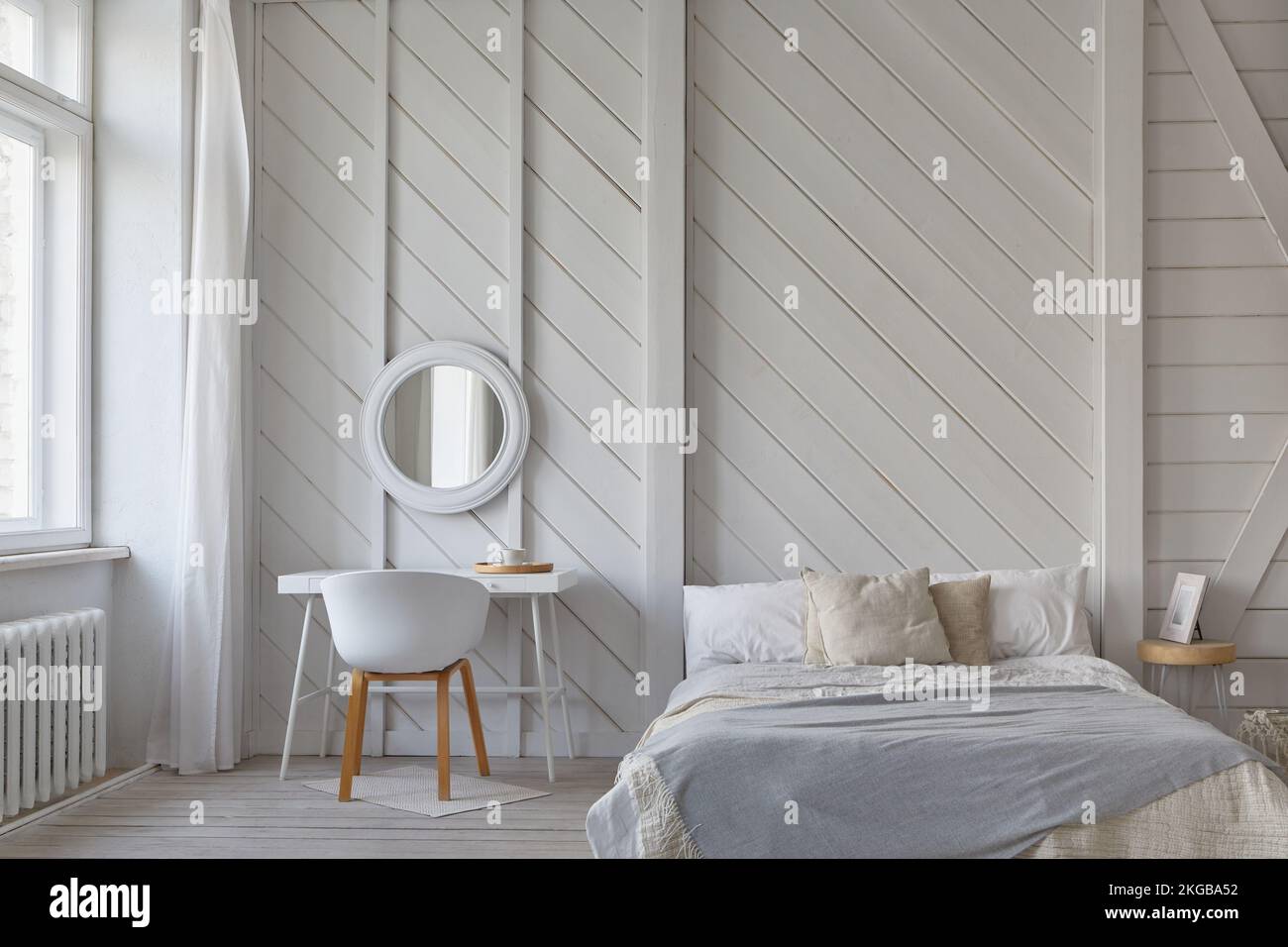 Bedroom white interior with table and armchair Stock Photo Alamy