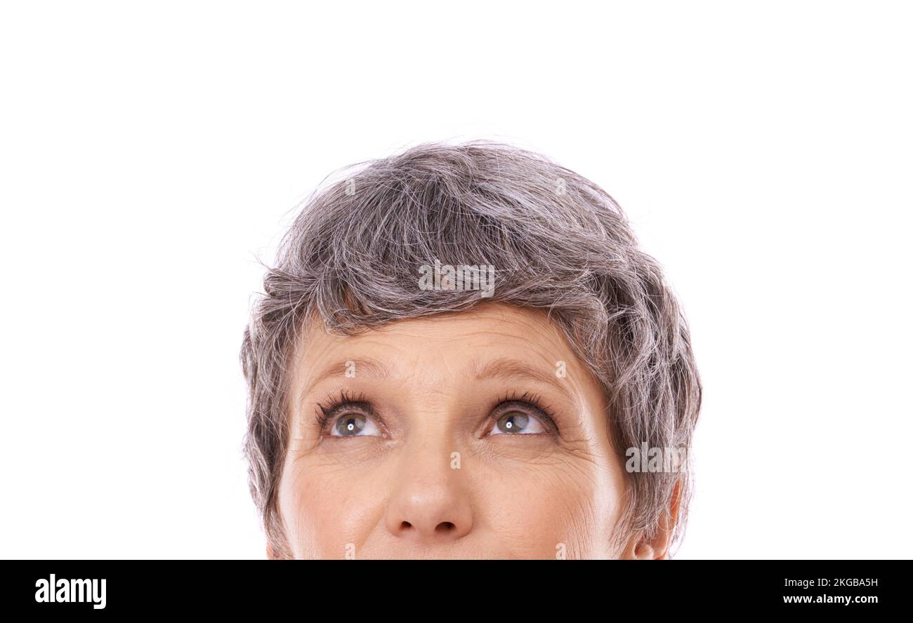 Musing with an idea. Cropped studio shot of a thoughtful mature woman against a white background. Stock Photo