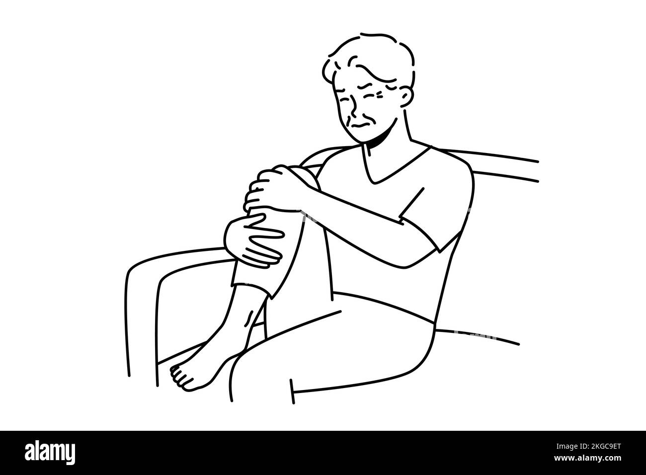 Unhealthy old man sit on couch suffer from knee pain. Unwell sick