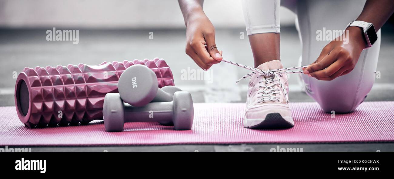 Fitness, weights and woman tying shoes before workout in gym for health ... - Swift Shoe-Tying Techniques For Gym Shoes