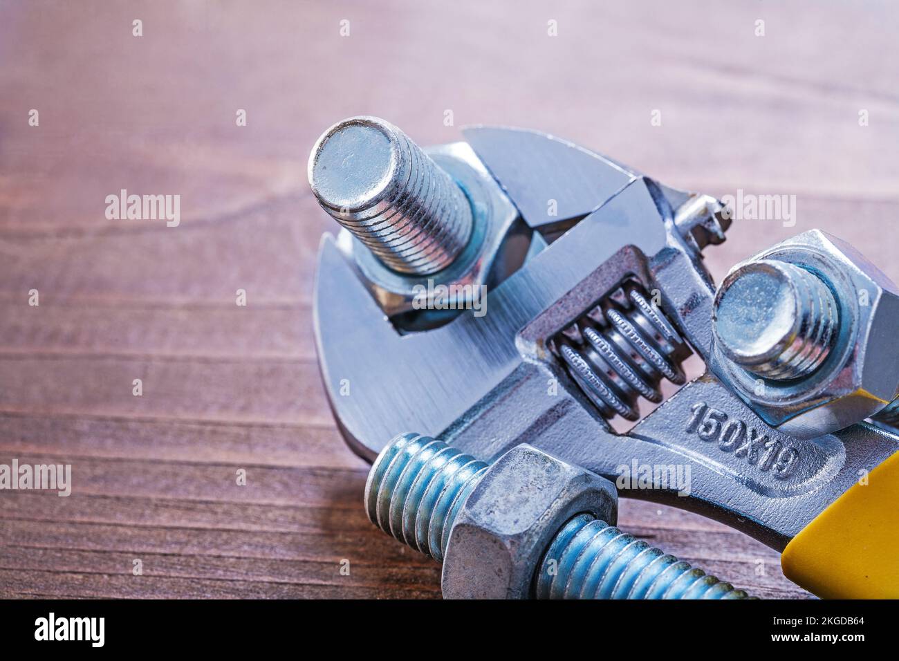 Adjustable key stainless threaded bolts and screw nuts on vintage