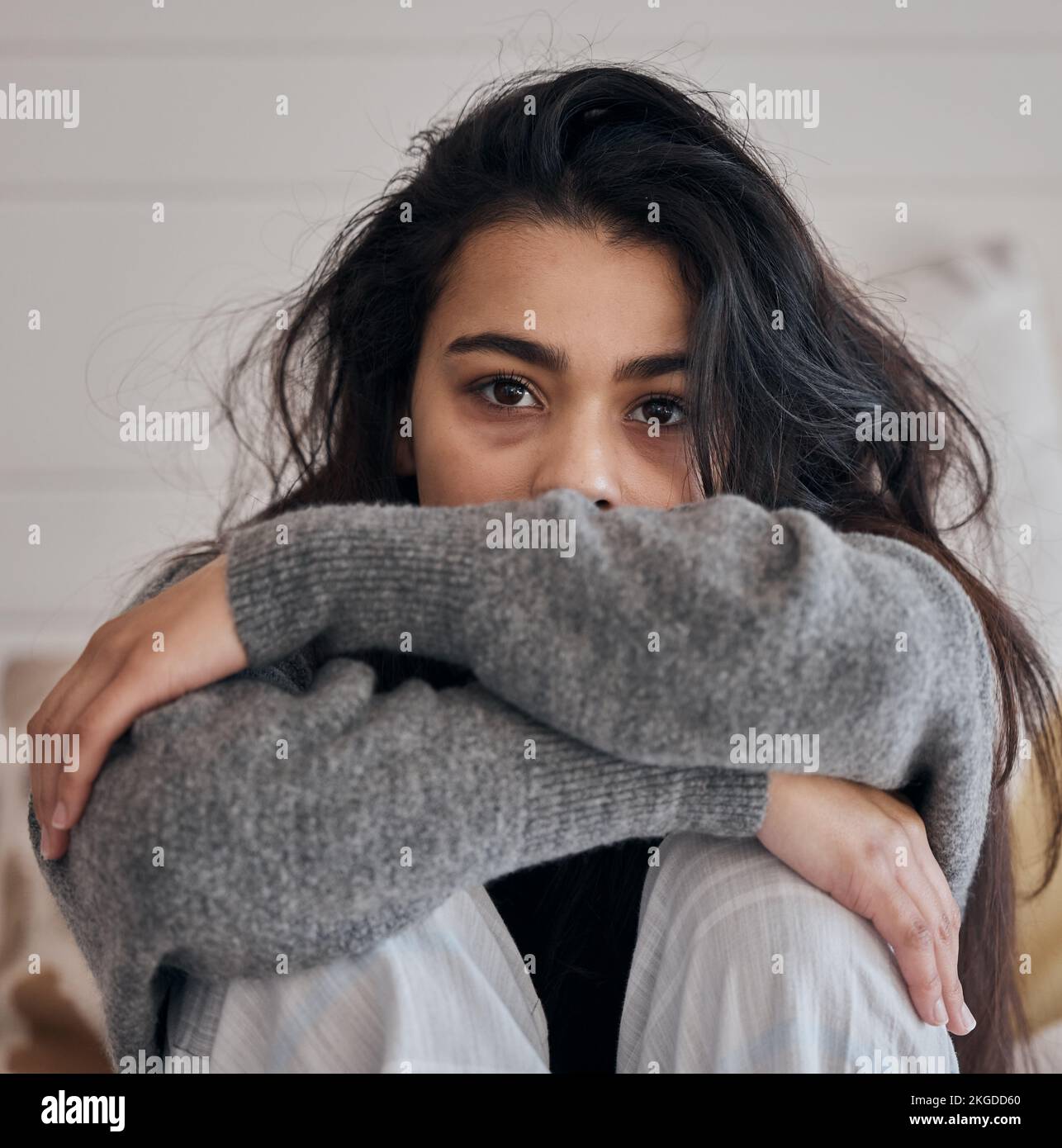 Face portrait, sad and woman with depression in home feeling lonely and